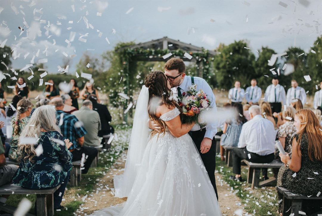 The first kiss with confetti raining down